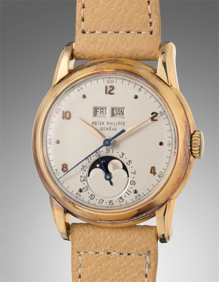 Patek Philippe 2497: A Rare 18K Gold Perpetual Calendar Watch with Moon Phases