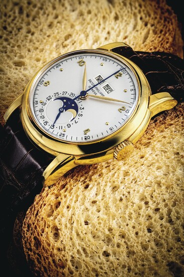 Patek Philippe 2497: A Rare 18K Gold Perpetual Calendar Watch with Moon Phases